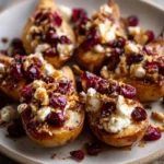 Sweet and Savory Baked Pears with Goat Cheese Honey and Cranberries - Featured Image