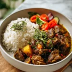 Spice Up Your Taste Buds with Authentic Jamaican Curry Goat - Featured Image